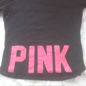 Pink sweater with logo on the back